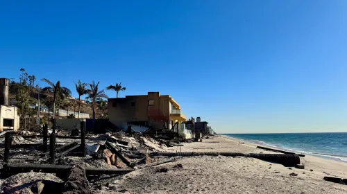 Houses burned next to the beach